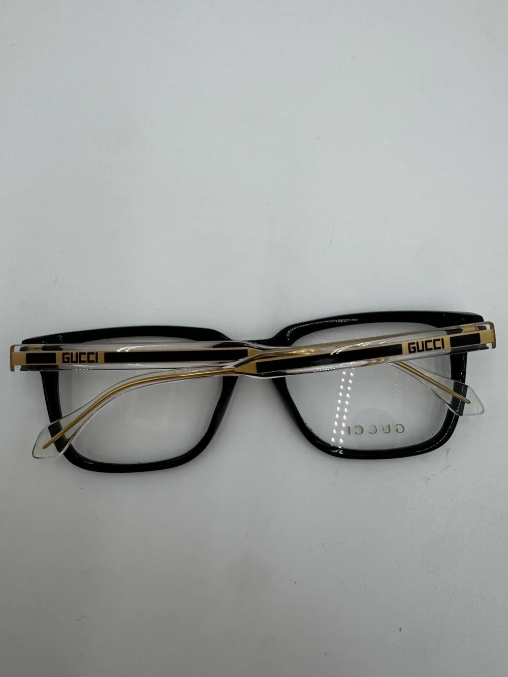 Gucci Black and Gold Rectangular Glasses